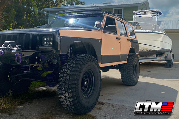 Custom Jeep Towing Boat