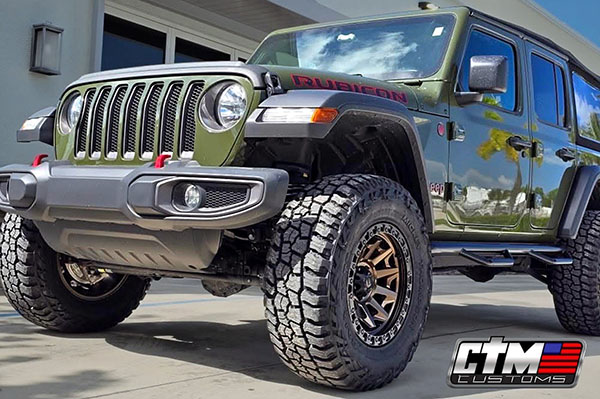 Jeep Wrangler Lifted with  Custom Wheels and Tires